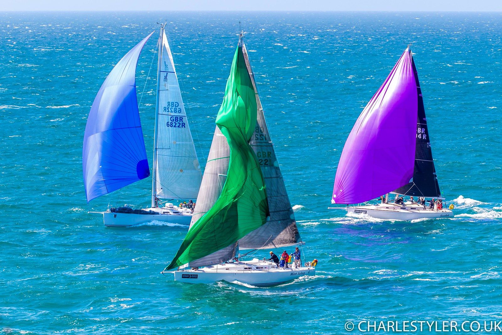Fleet of yachts seen from a high vantage point at St Catherine's Point