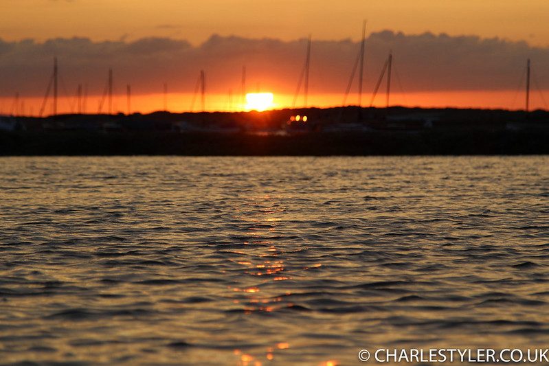 Sea glistening under the setting sun